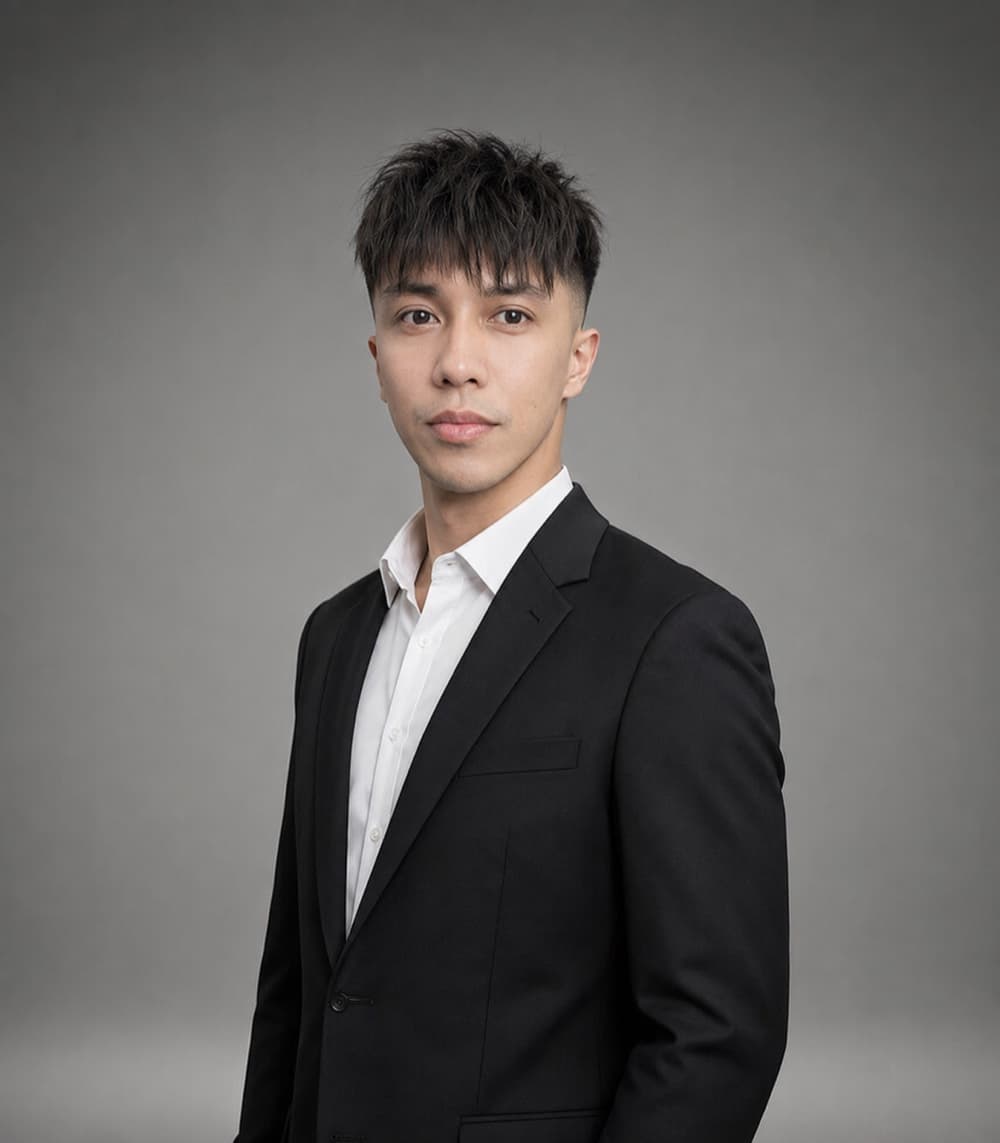Azim, Senior Stylist at Miin Singapore wearing a black suit