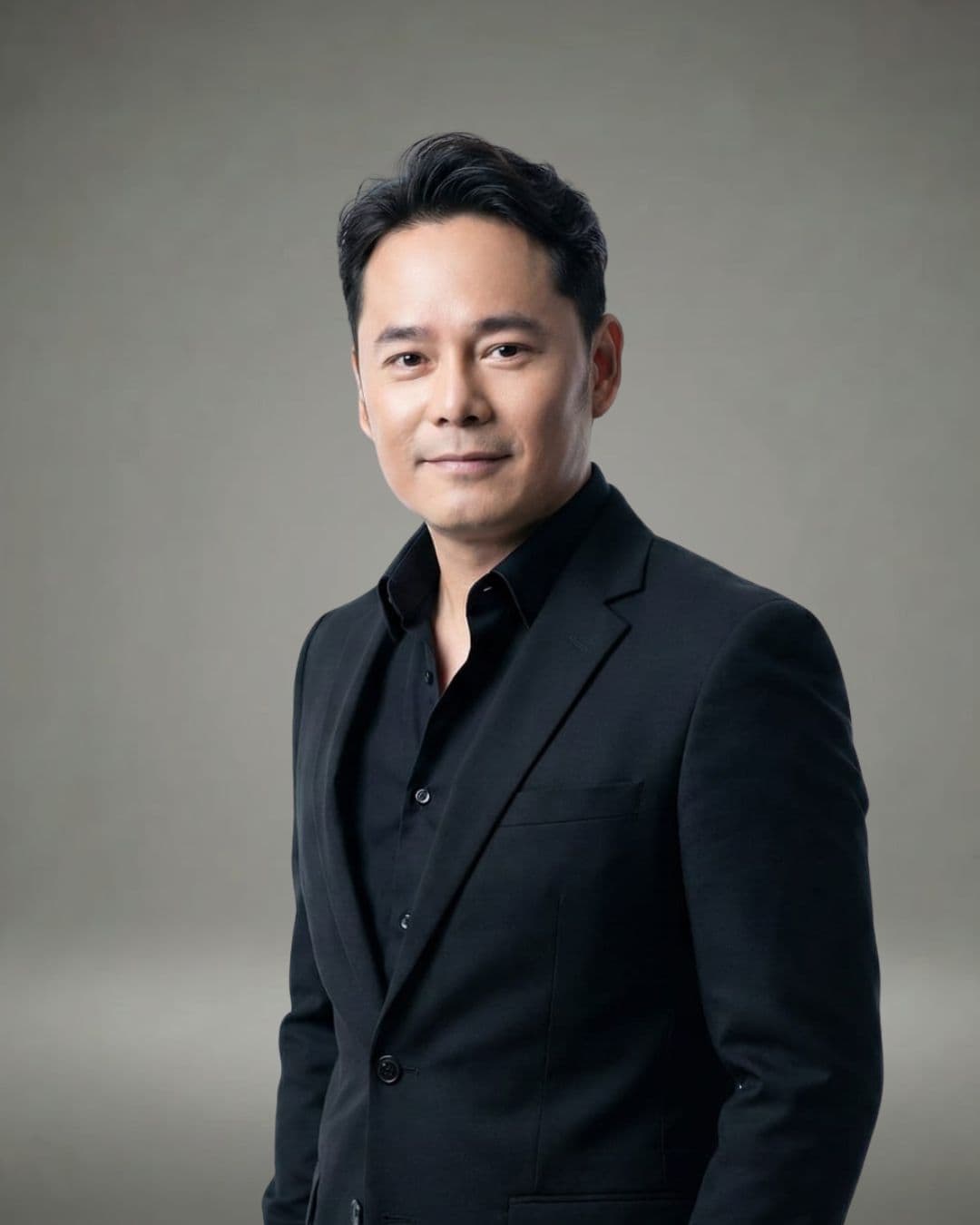 Marcel, stylist at Miin Singapore wearing a black suit