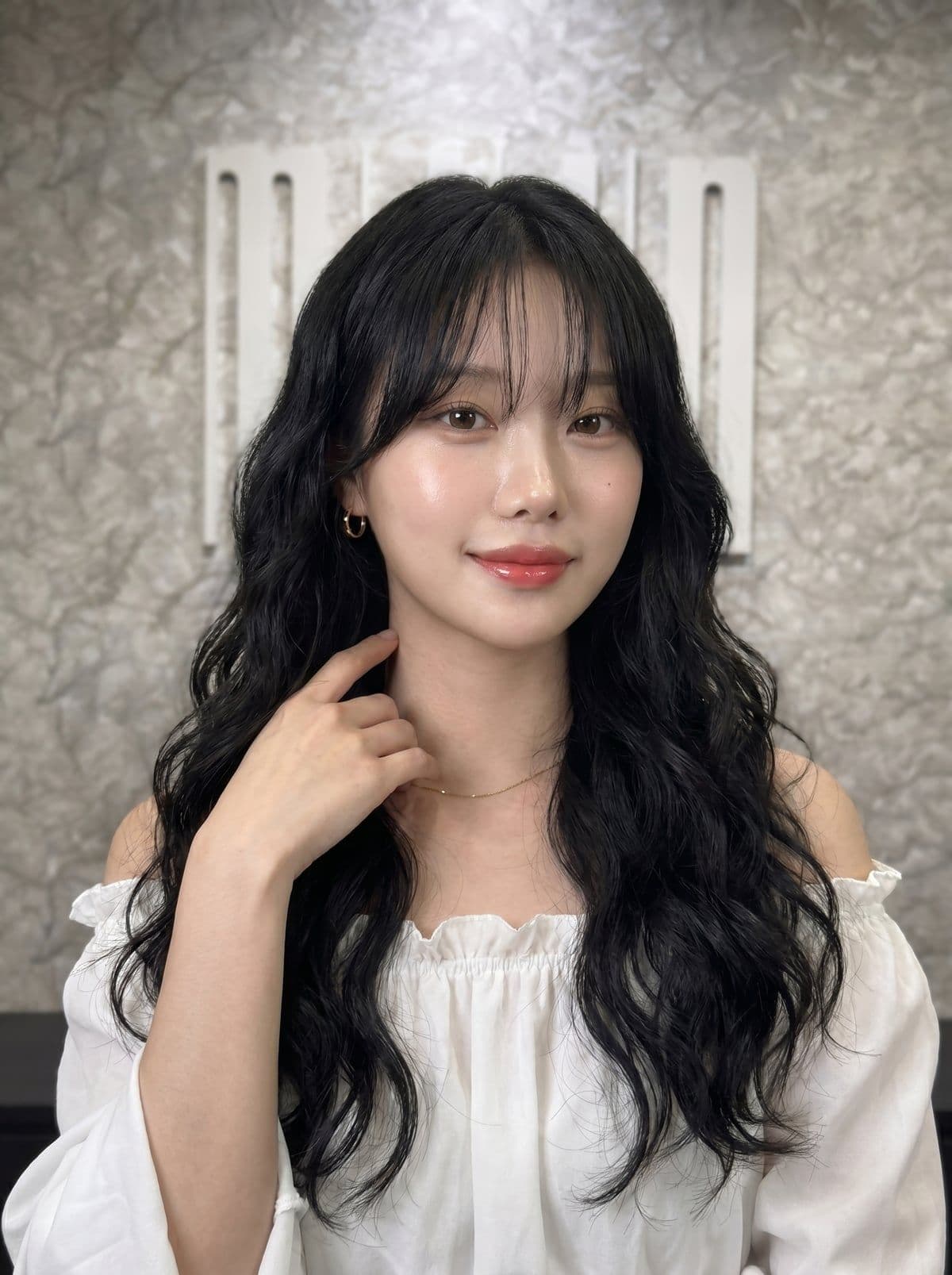 Cloud perm — voluminous all-over soft curls on long hair, styled at Miin salon Singapore