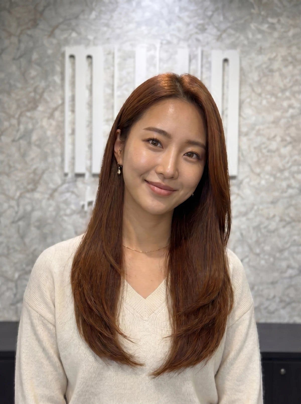 Chestnut brown hair color — rich warm brown with subtle auburn undertones, styled at Miin salon Singapore