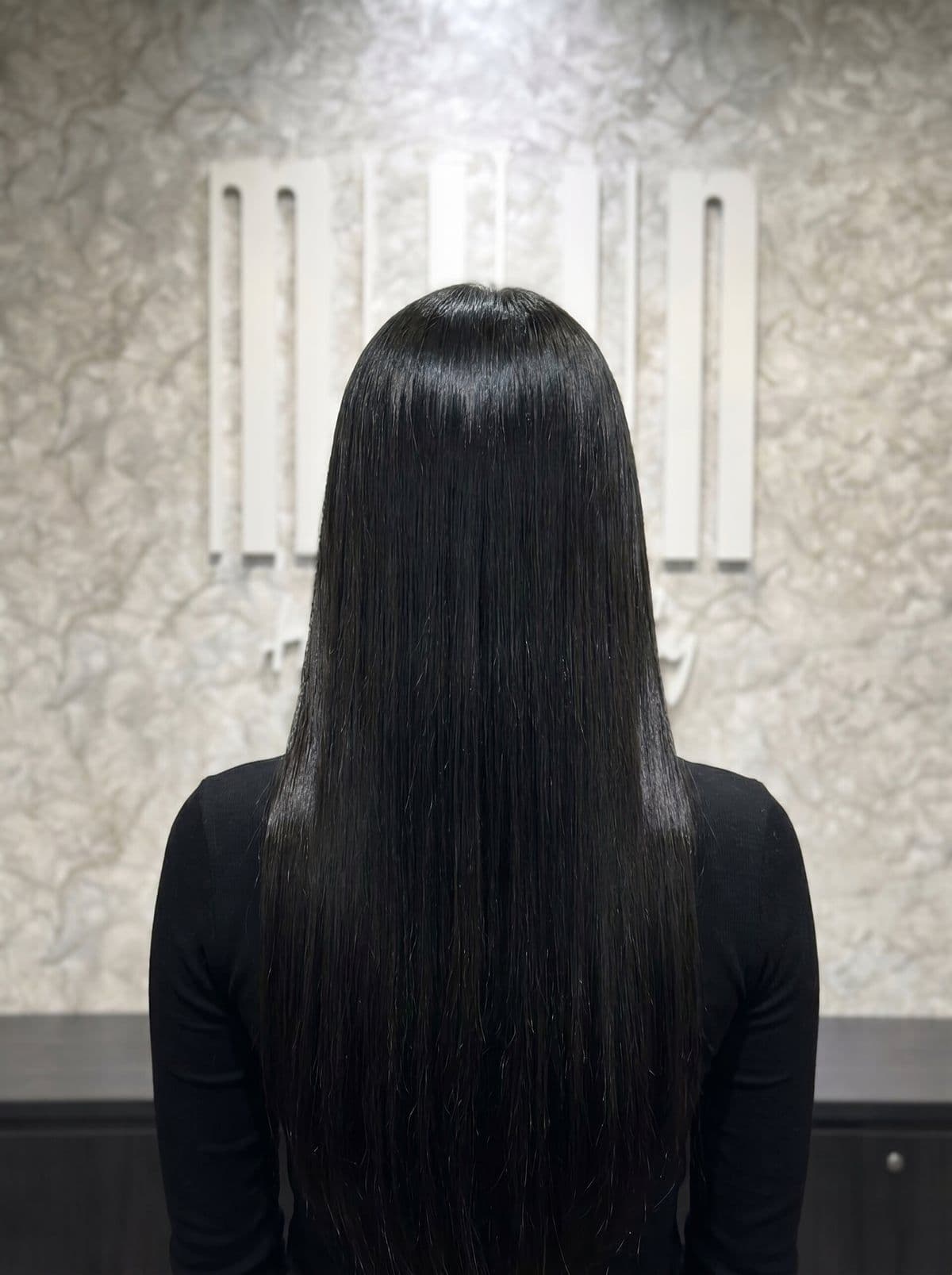 Korean rebonding back view at Miin salon Singapore — mirror-like light band running down perfectly straight hair