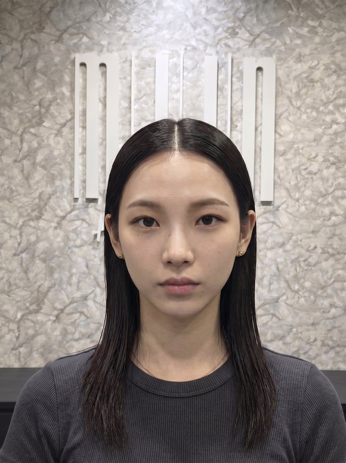 Flat hair before root perm — showing the lack of volume at the crown that root perm solves