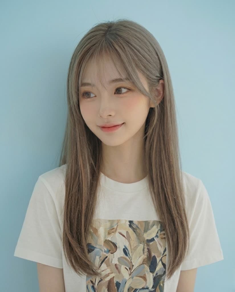 Color result: soft ash tone on long straight hair